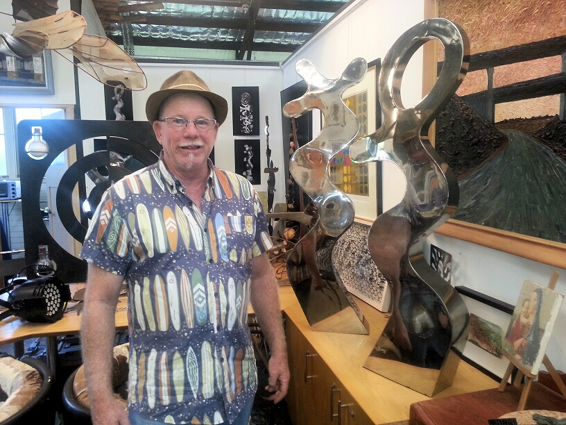 Stephen Coburn with his art